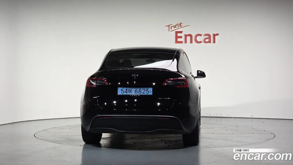 Tesla Model Y — фото 4