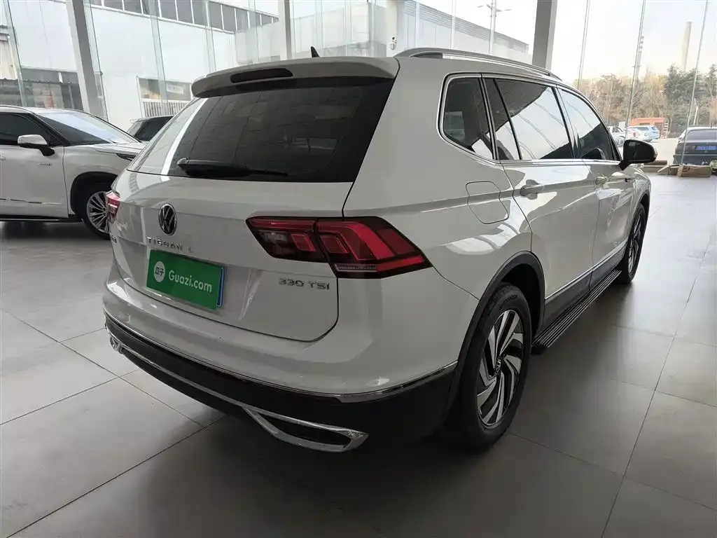 Volkswagen Tiguan L — фото 7