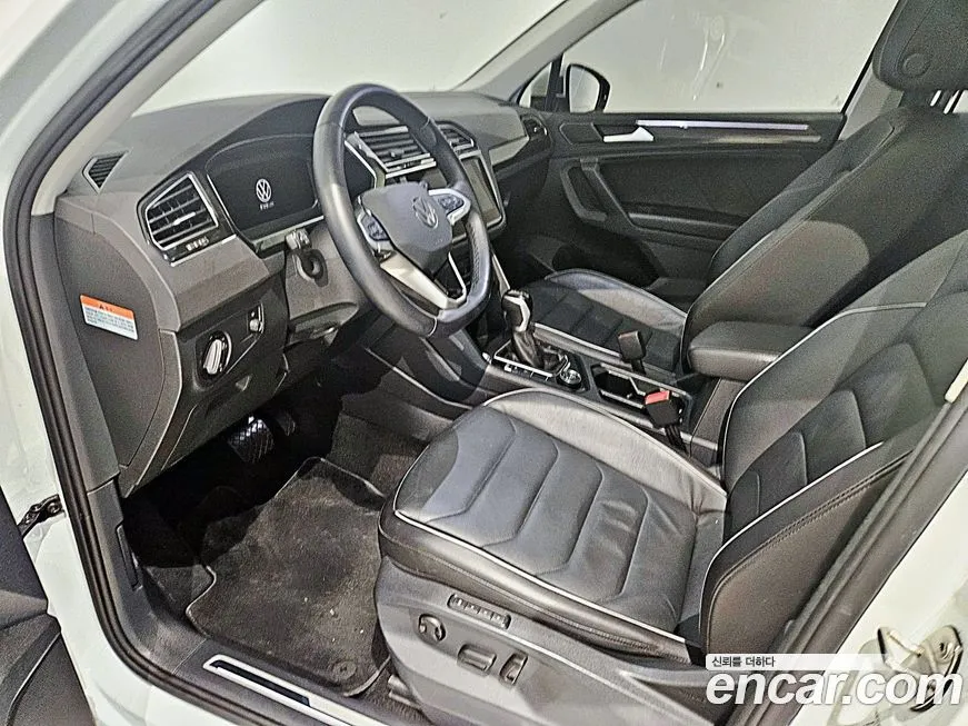 Volkswagen Tiguan — фото 10
