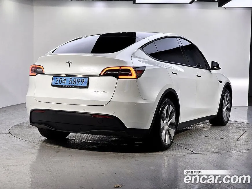 Tesla Model Y — фото 4
