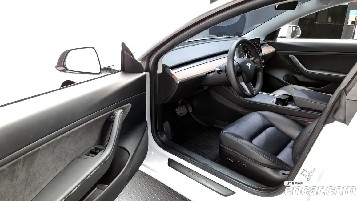 Tesla Model 3 — фото 10