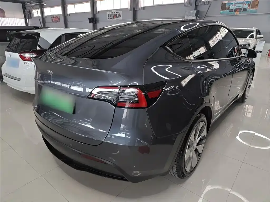 Tesla Model Y — фото 7