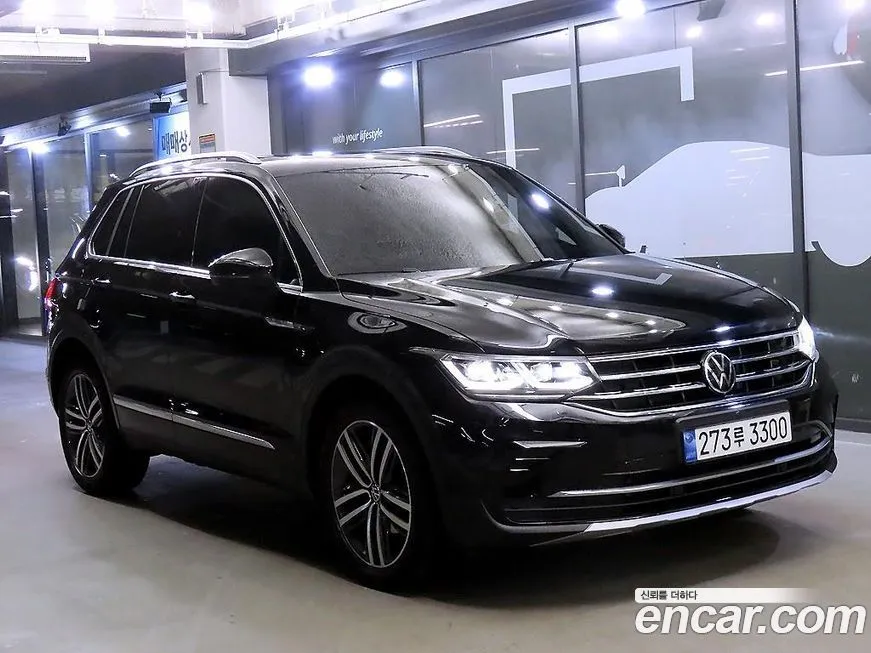 Volkswagen Tiguan — фото 1