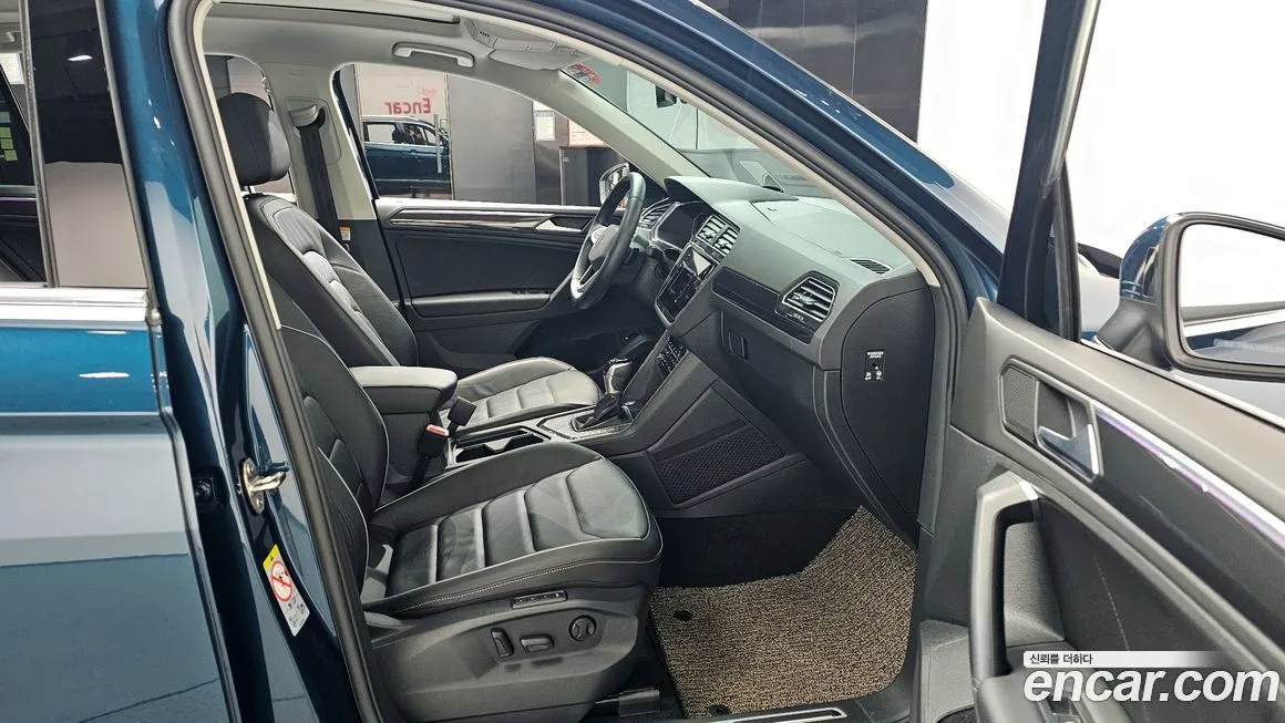 Volkswagen Tiguan — фото 10