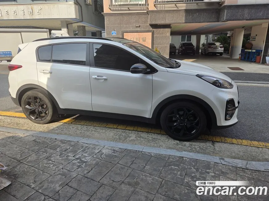 Kia Sportage — фото 1