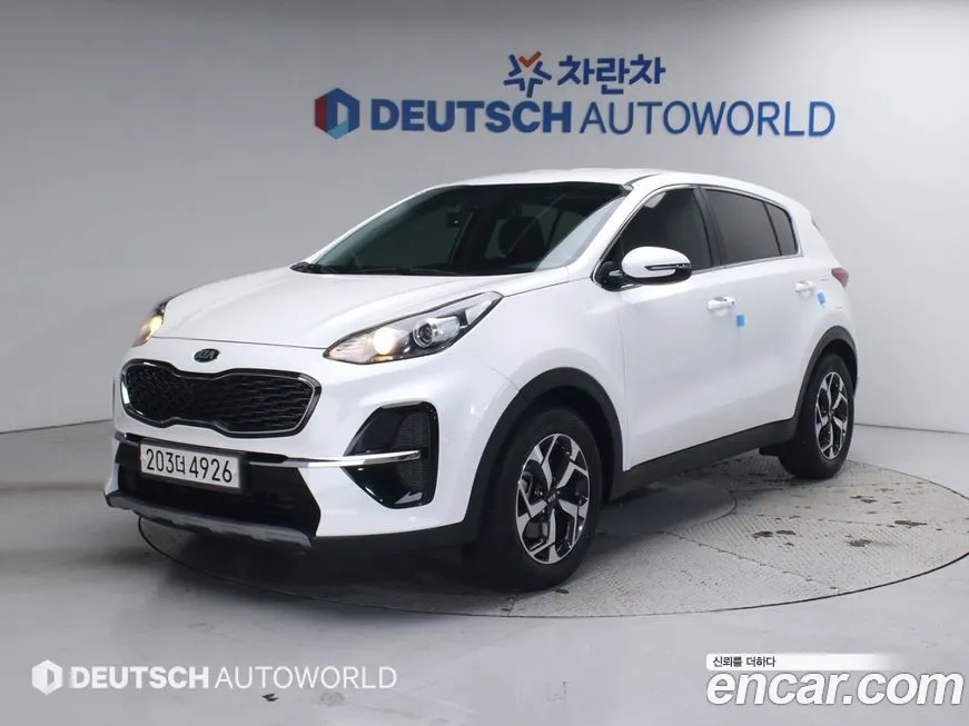 Kia Sportage — фото 1