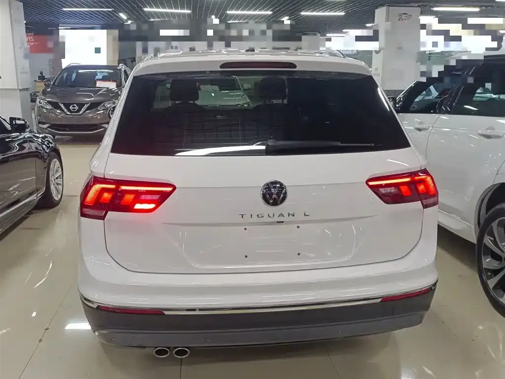 Volkswagen Tiguan L — фото 6