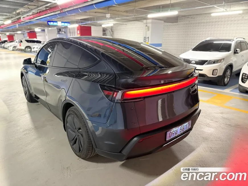 Tesla Model Y — фото 7