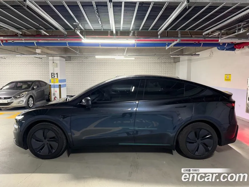 Tesla Model Y — фото 8