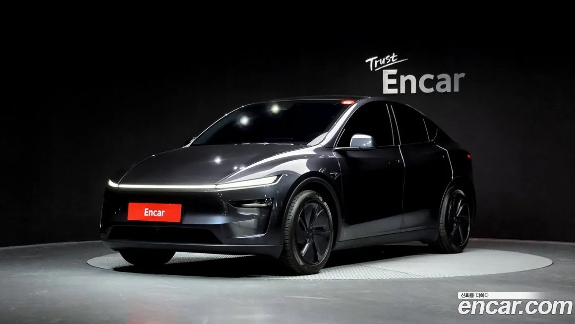 Tesla Model Y — фото 1