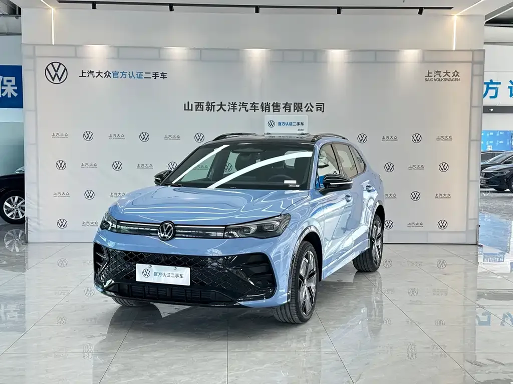 Volkswagen Tiguan L — фото 1