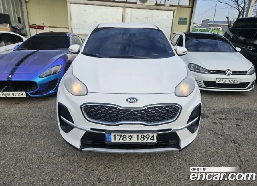 Kia Sportage — фото 1