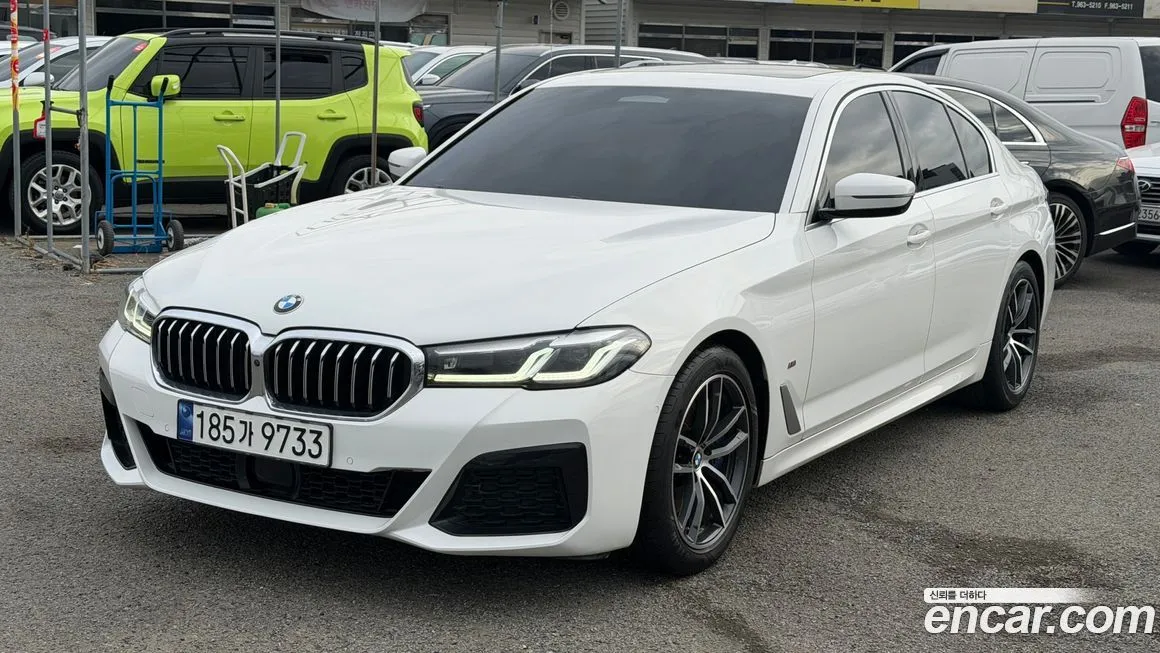 BMW 5-Series — фото 1