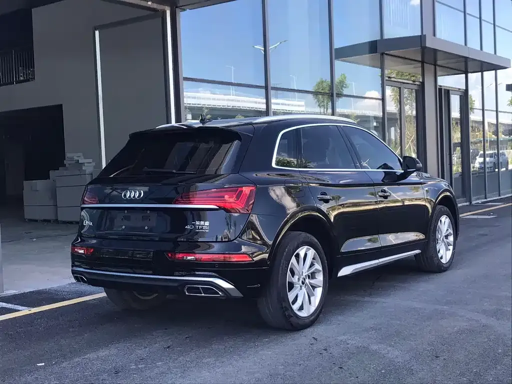 Audi Q5L — фото 5