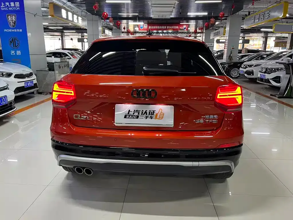 Audi Q2L — фото 8