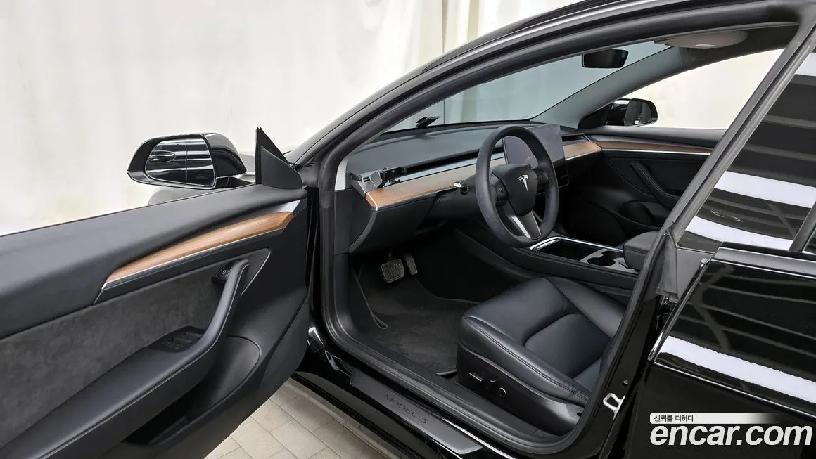 Tesla Model 3 — фото 10
