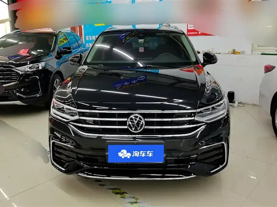 Volkswagen Tiguan L — фото 2