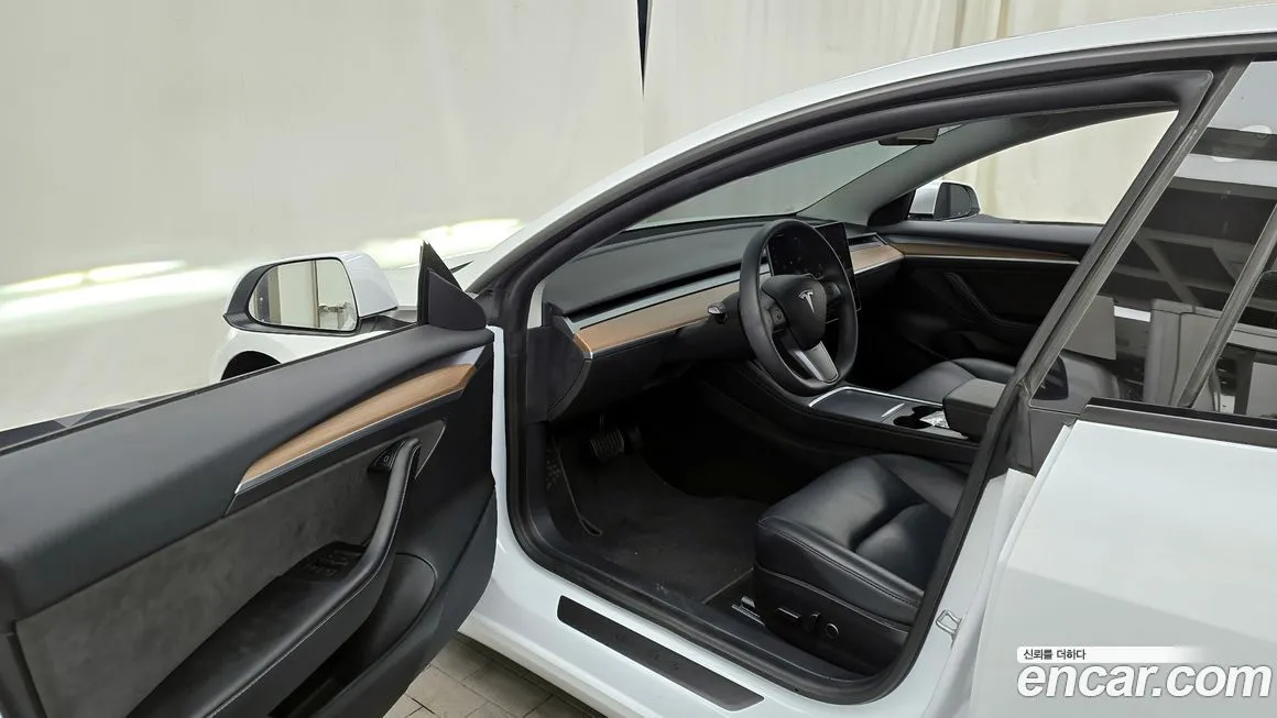 Tesla Model 3 — фото 10