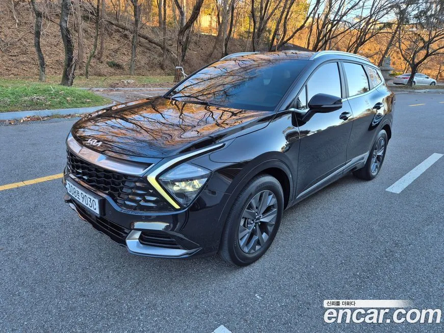 Kia Sportage — фото 1