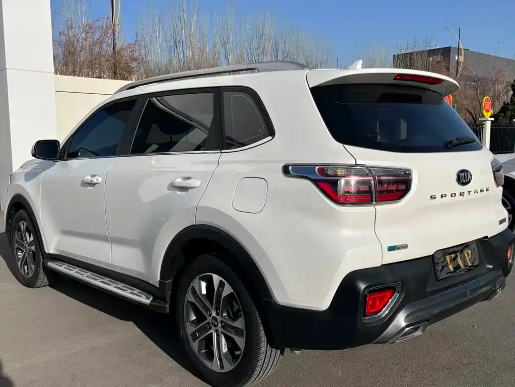 Kia Sportage — фото 9