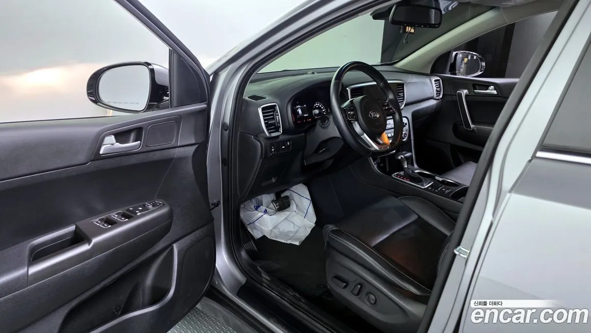 Kia Sportage — фото 10
