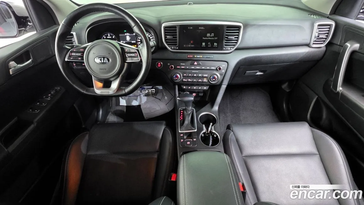 Kia Sportage — фото 7