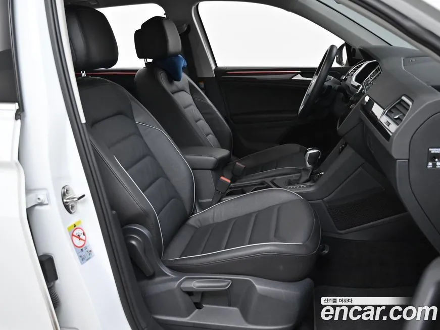 Volkswagen Tiguan — фото 10