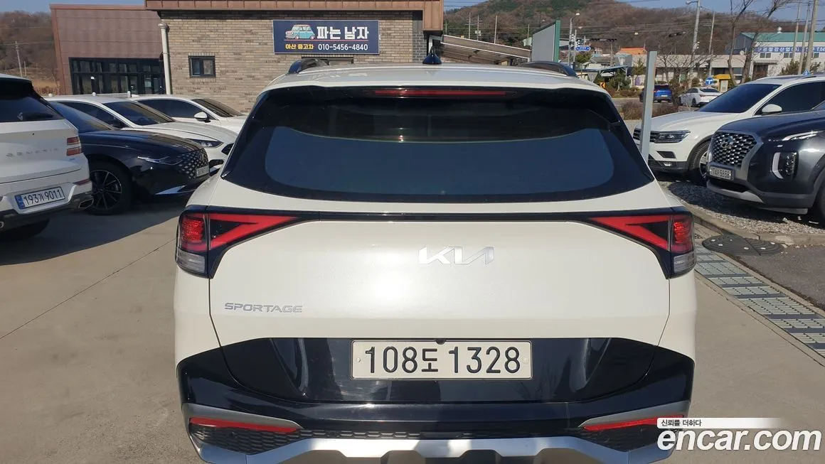 Kia Sportage — фото 6