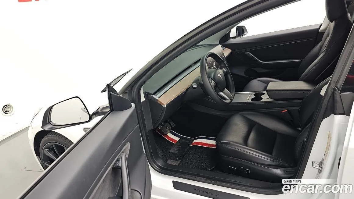 Tesla Model 3 — фото 10