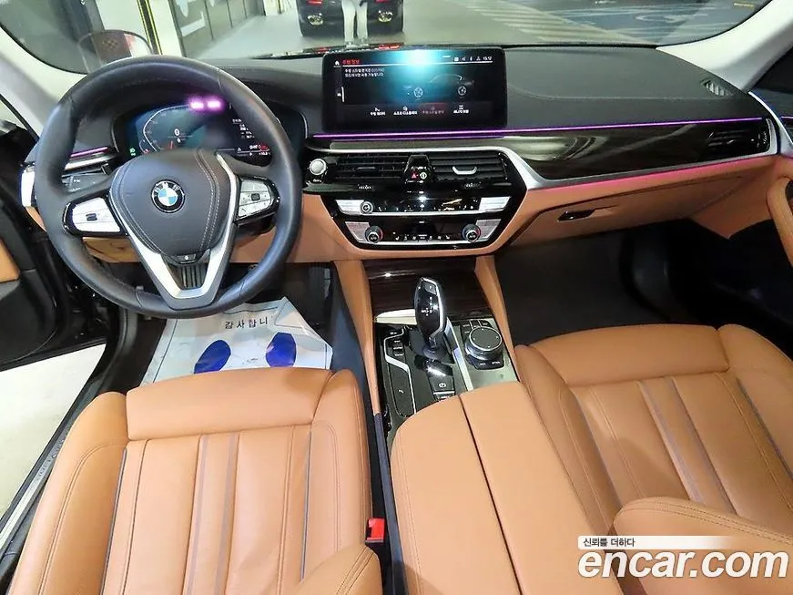 BMW 5-Series — фото 10