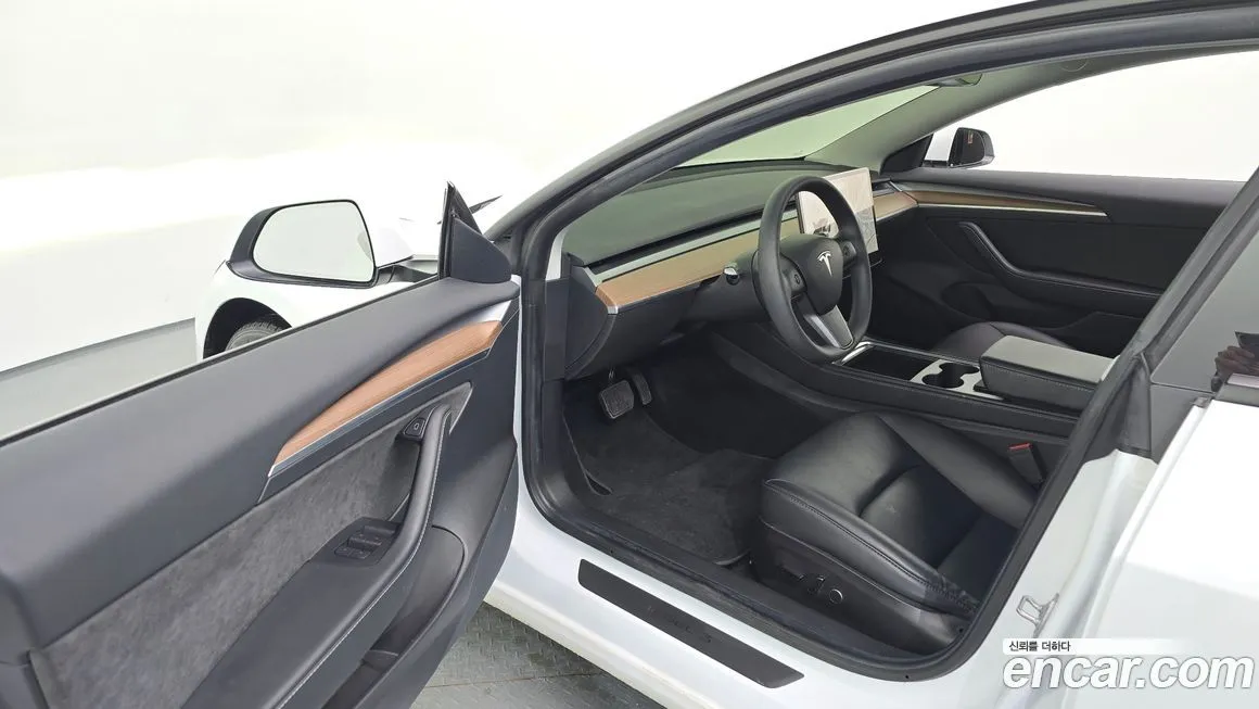 Tesla Model 3 — фото 10