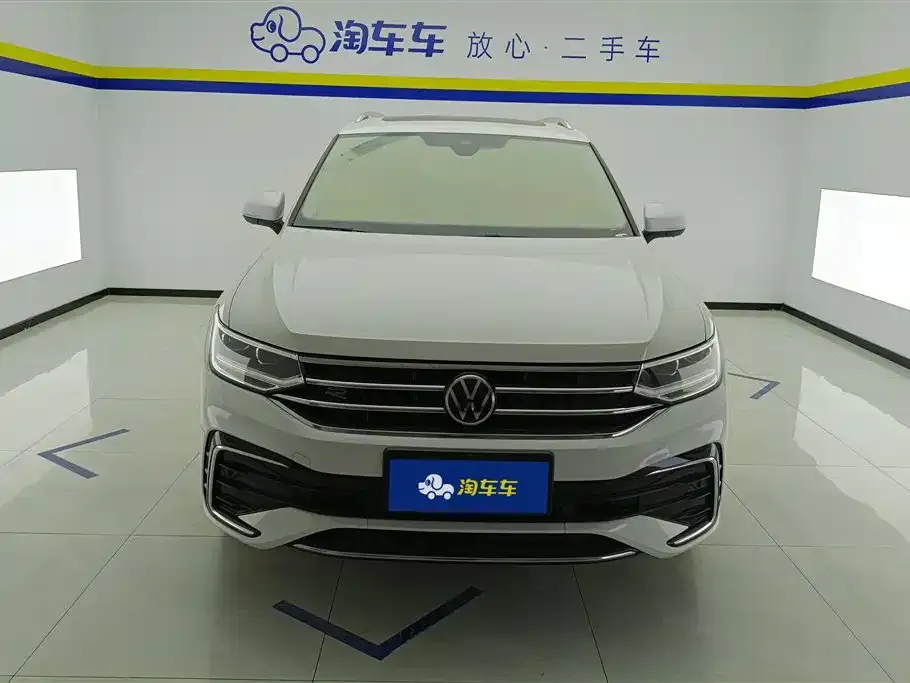 Volkswagen Tiguan L — фото 1