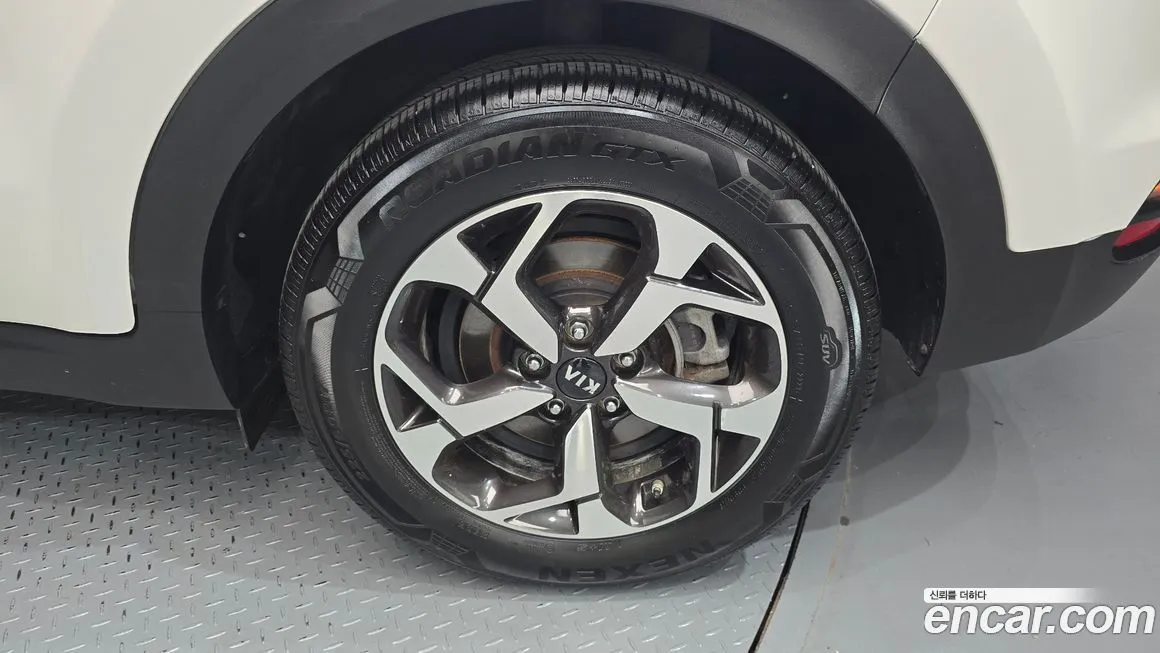 Kia Sportage — фото 5