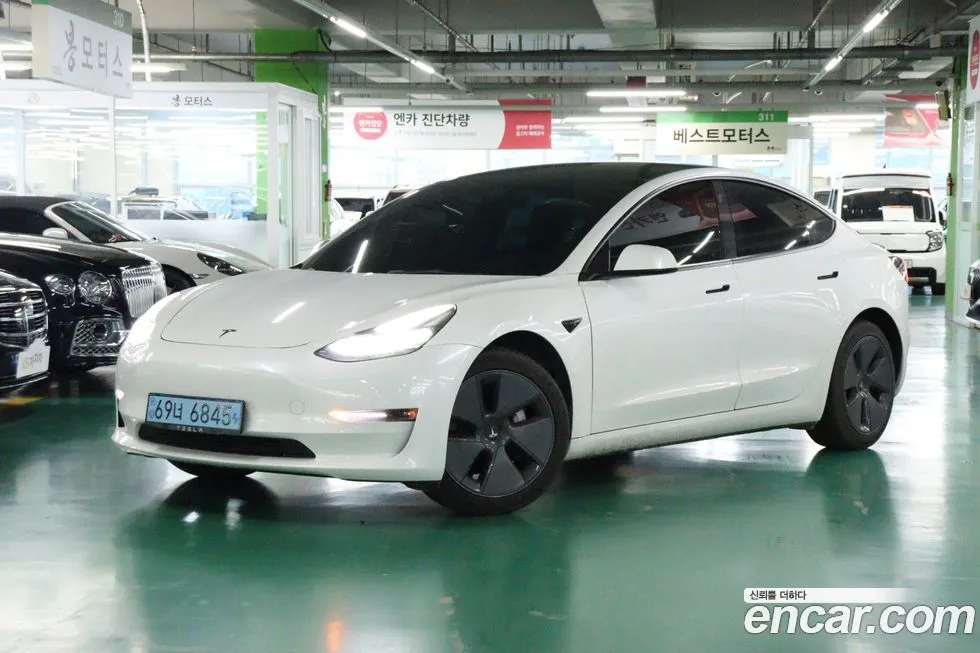 Tesla Model 3 — фото 2