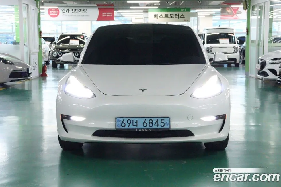 Tesla Model 3 — фото 3