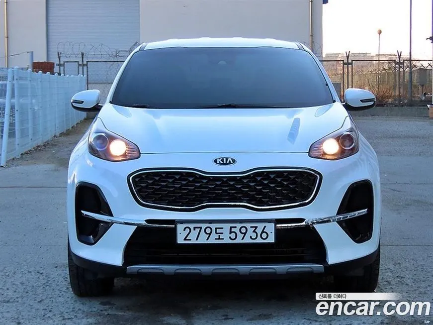 Kia Sportage — фото 1