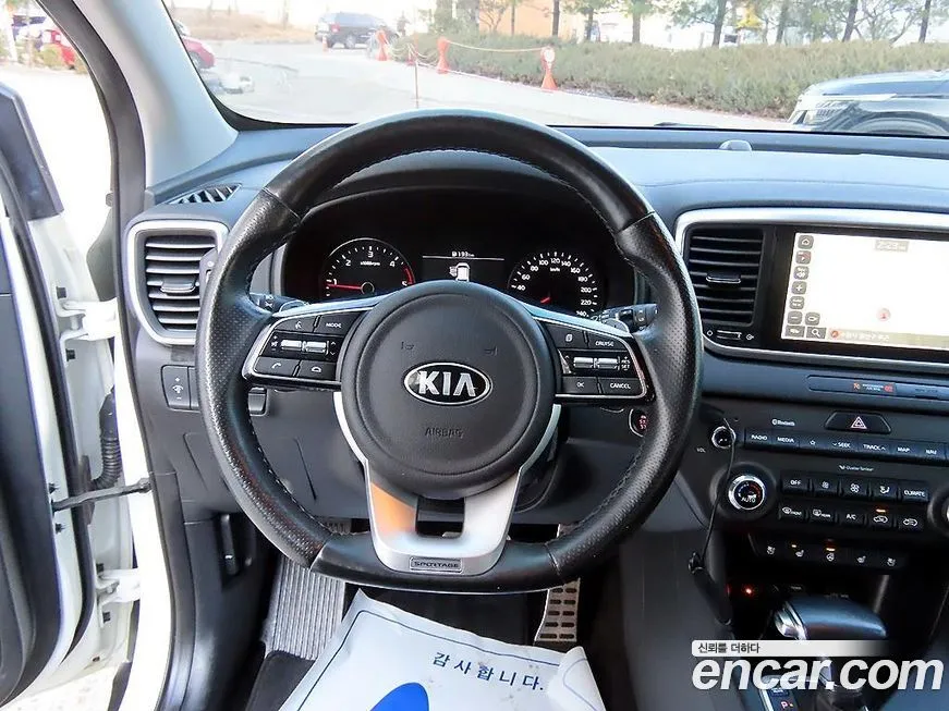 Kia Sportage — фото 8