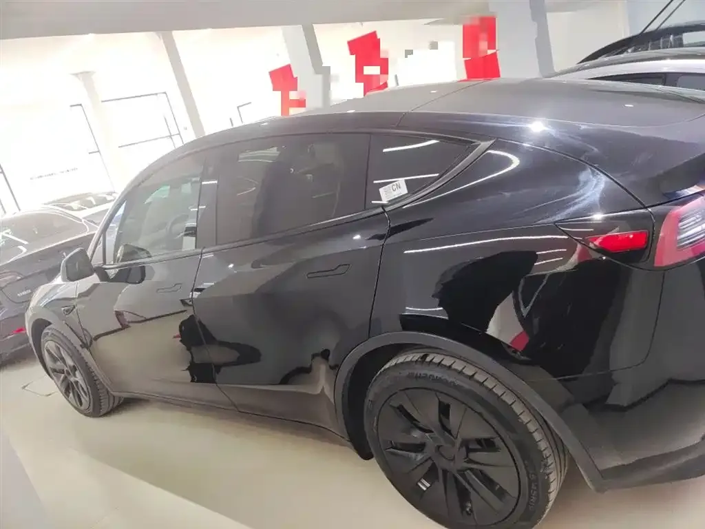 Tesla Model Y — фото 5
