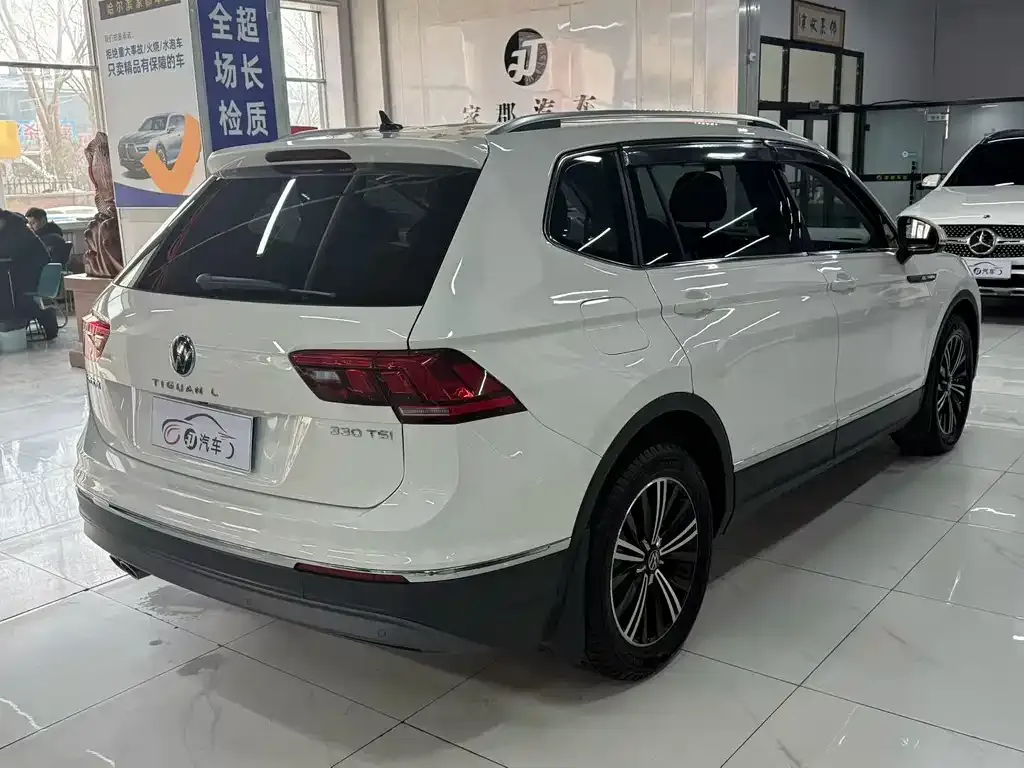 Volkswagen Tiguan L — фото 6