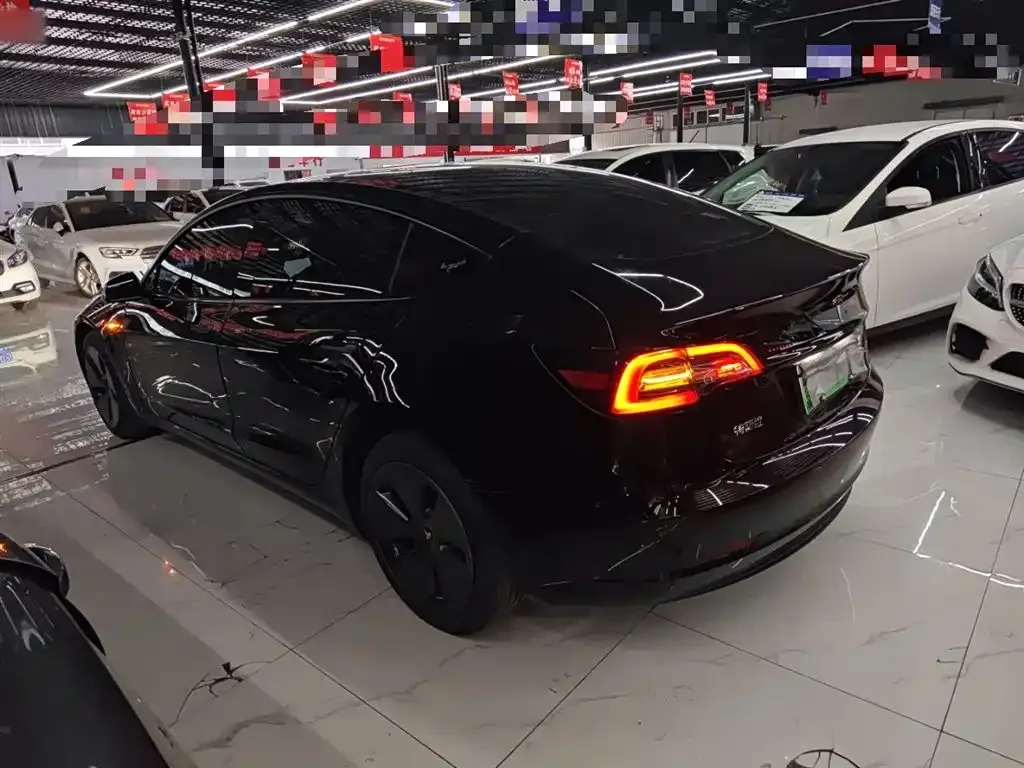 Tesla Model 3 — фото 5
