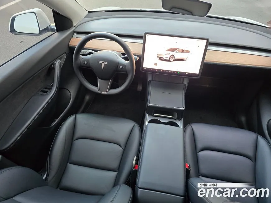 Tesla Model Y — фото 10