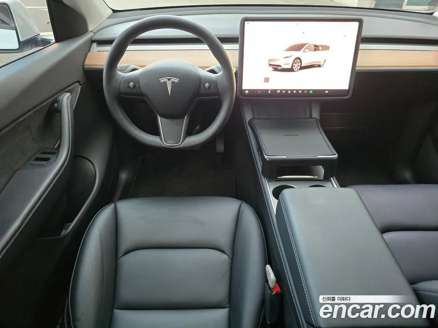 Tesla Model Y — фото 9