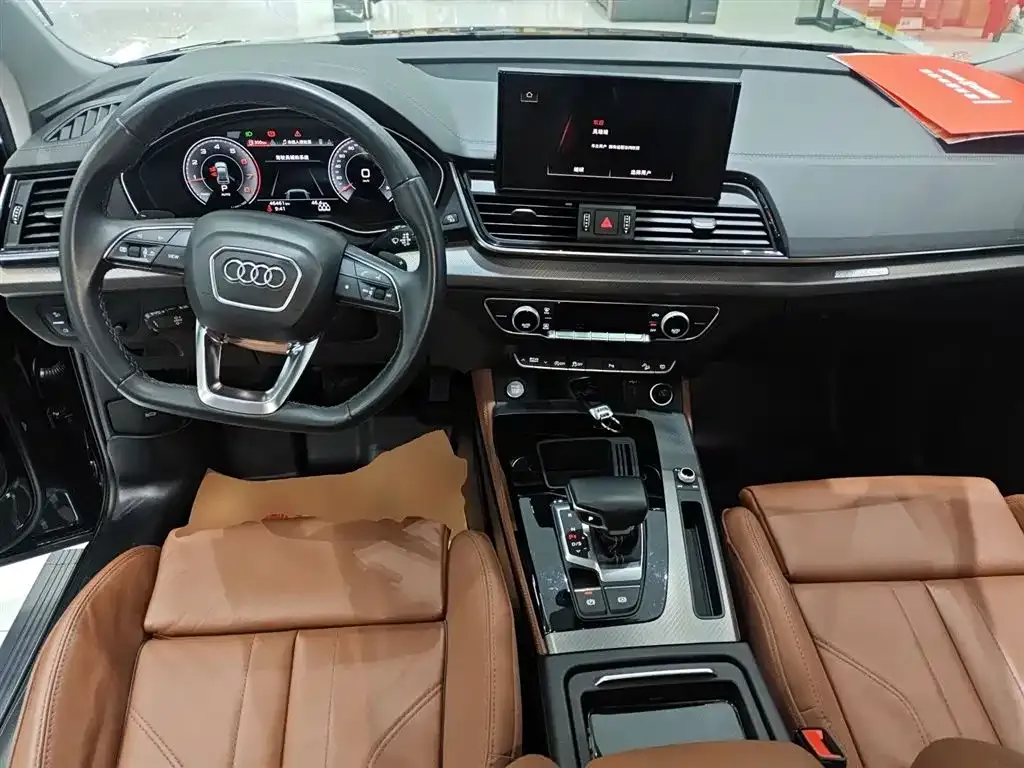 Audi Q5L — фото 10