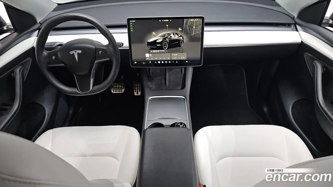 Tesla Model Y — фото 7