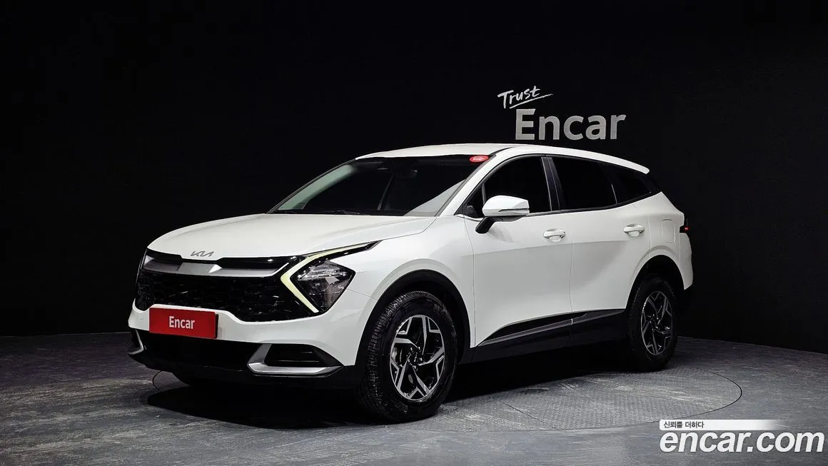Kia Sportage — фото 1