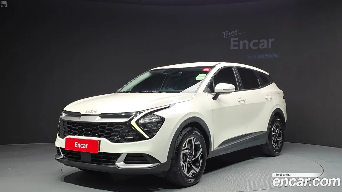 Kia Sportage — фото 1