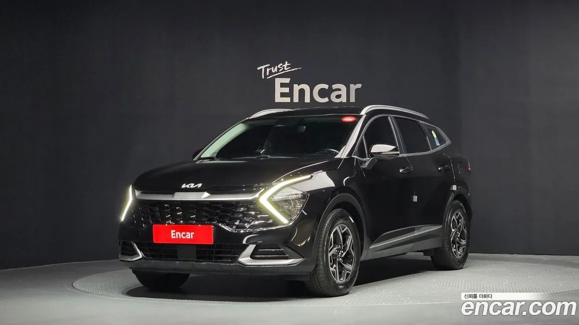 Kia Sportage — фото 1