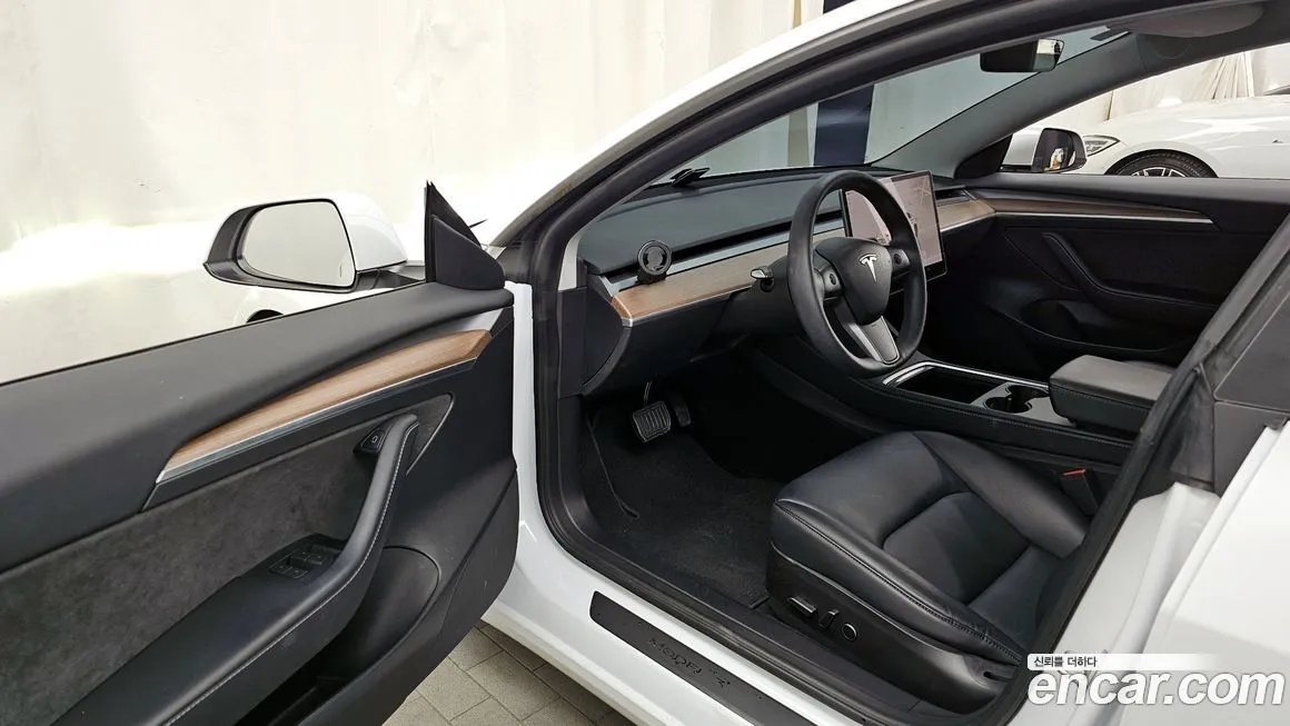 Tesla Model 3 — фото 10