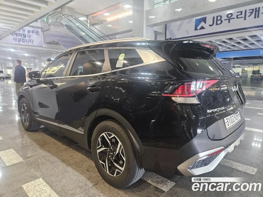 Kia Sportage — фото 7