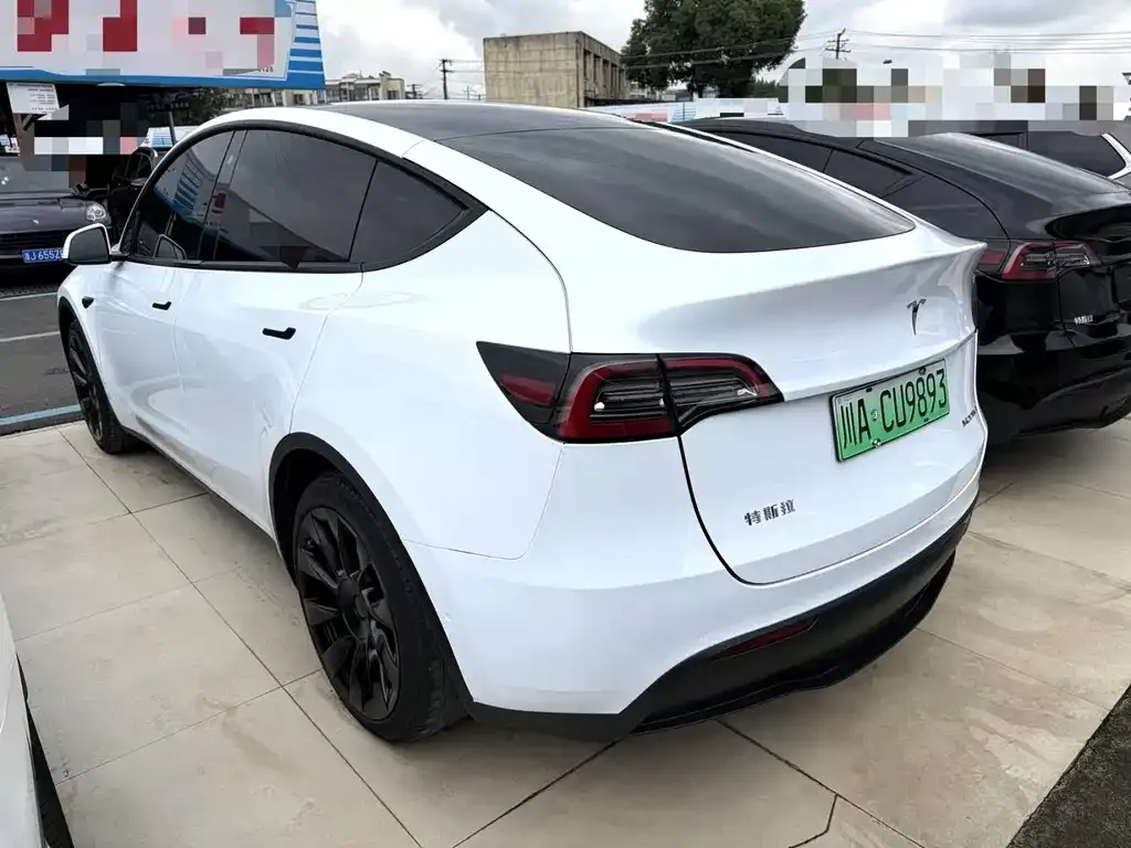 Tesla Model Y — фото 7